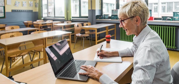 Teacher with computer